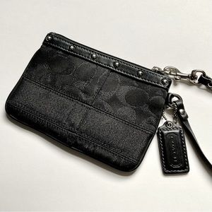 COACH Wristlet. Jacquard Print Lurex with Studded Leather Trim.